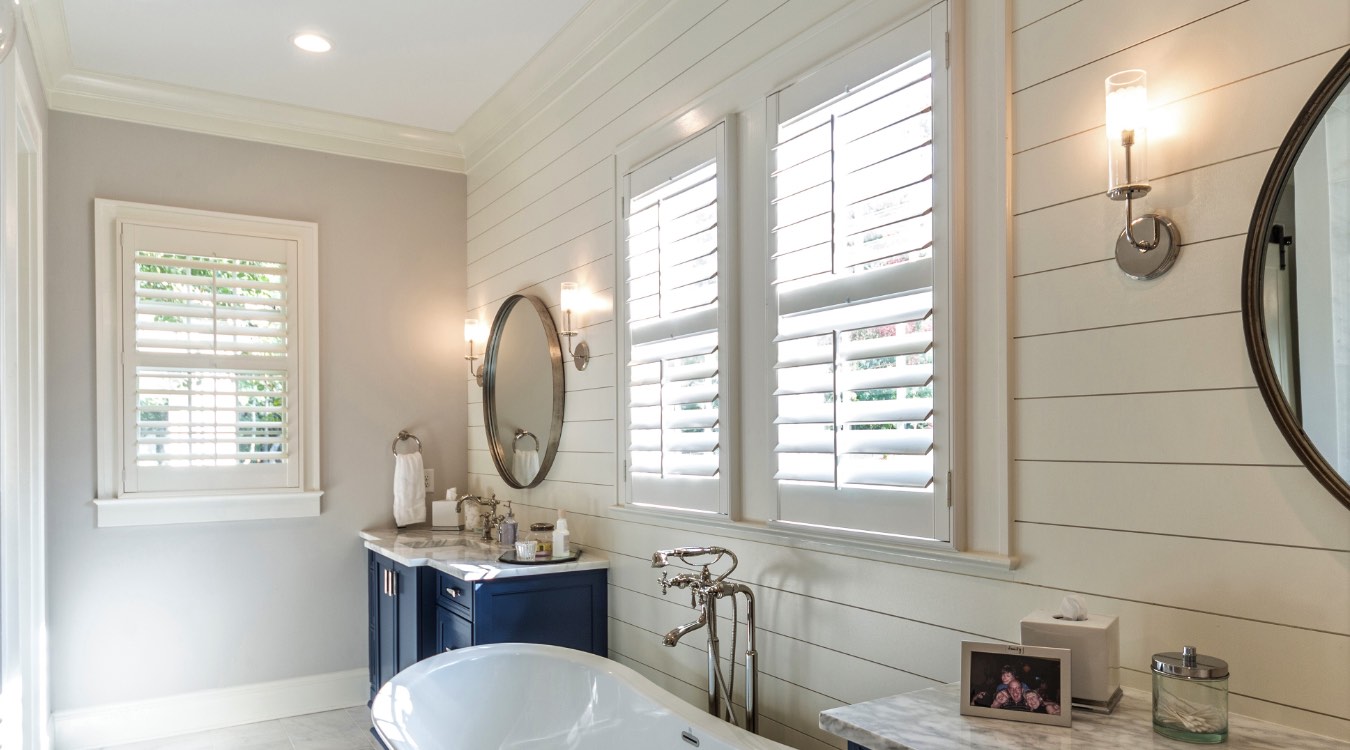 Philadelphia bathroom with white plantation shutters.