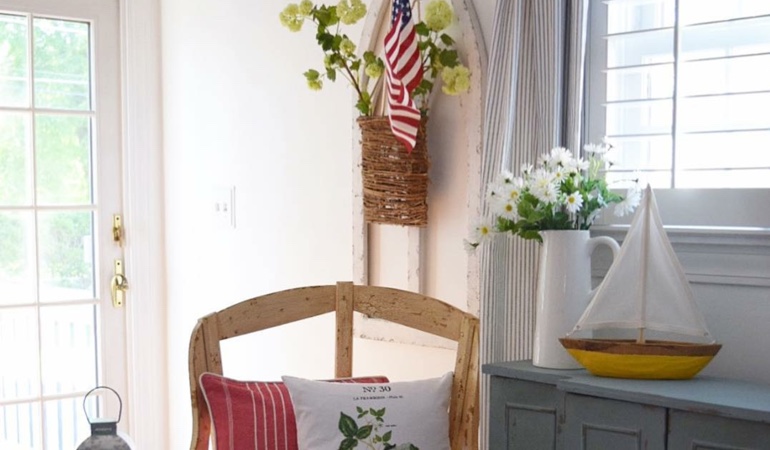 Bright sitting corner with faux wood plantation shutters in Philadelphia. Faux wood plantation shutters in Philadelphia