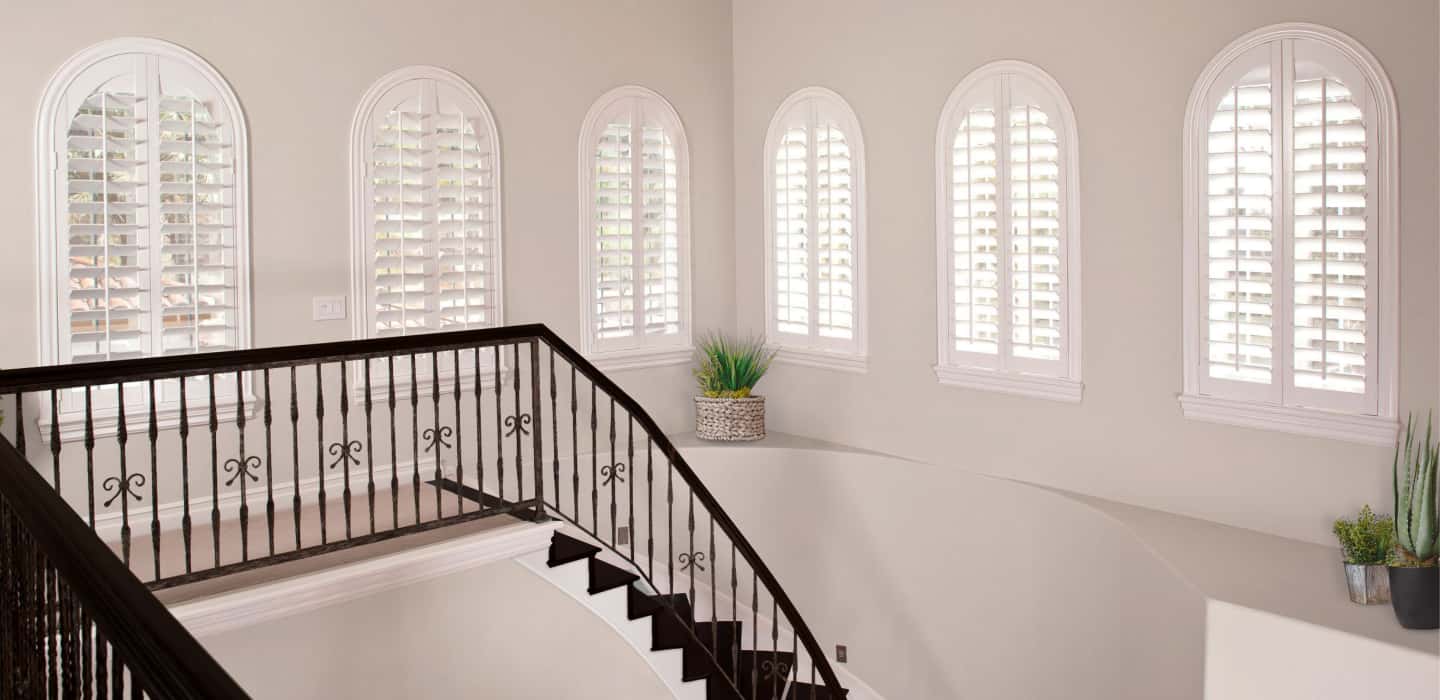 Custom treatments perfectly cover your window and hang perfectly. Arched Plantation Shutters