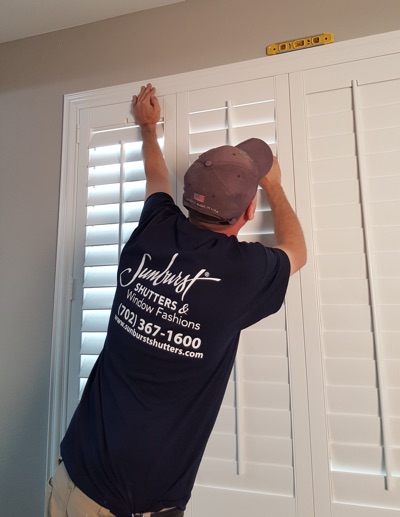 Shutter installation in Philadelphia bedroom.