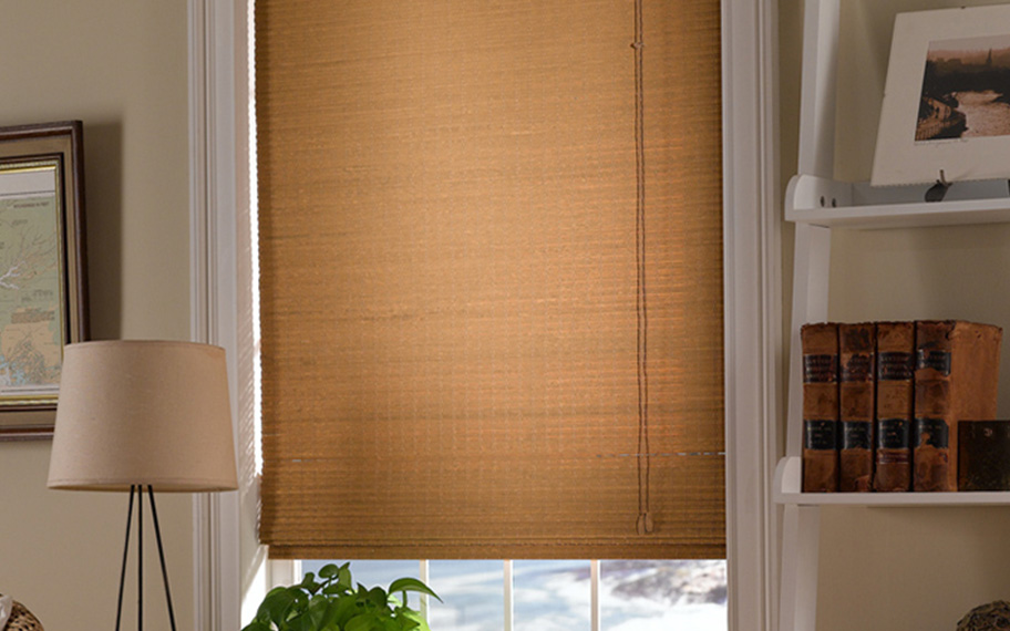 Add a touch of nature to your decor with woven fiber shades in Philadelphia. Tan woven fiber shades in a living room