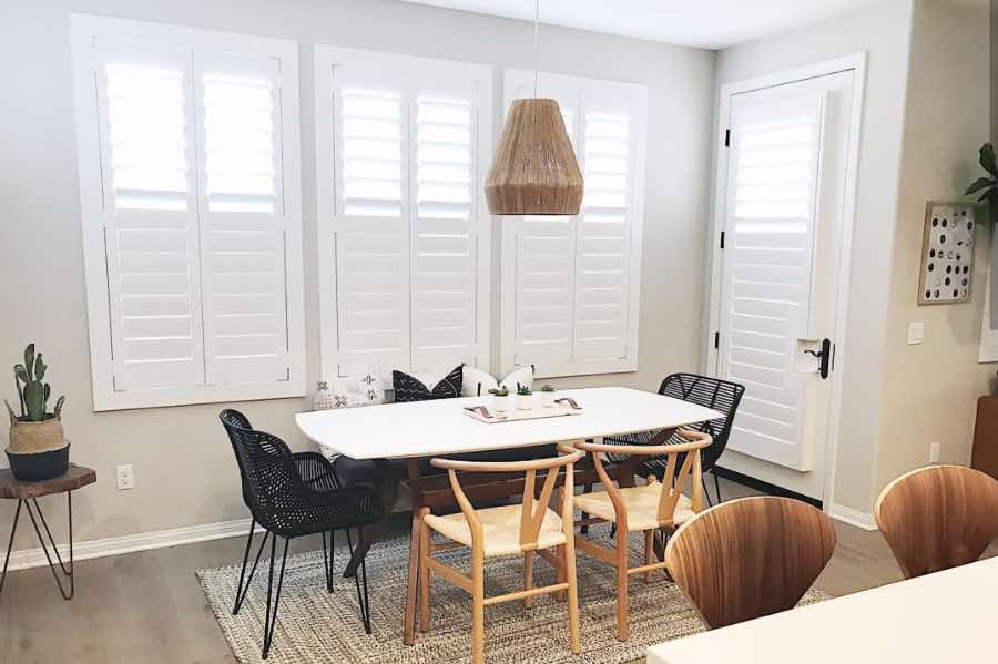Use Polywood shutters to control natural light levels in your Philadelphia dining room. Polywood shutters with top louvers tilted open in a dining room