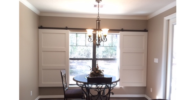 Barn doors open horizontally with slides instead of cords. Philadelphia barn door shutters