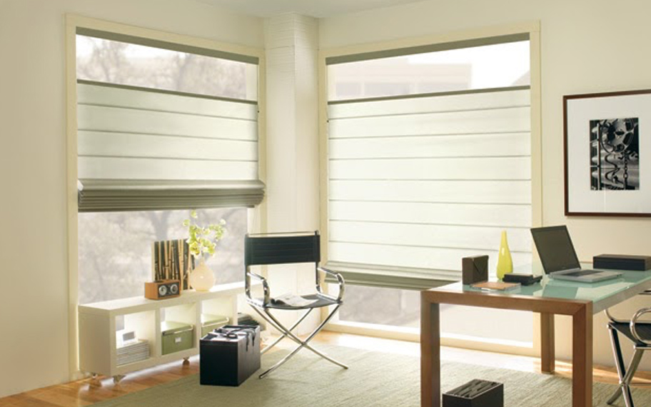 Upgrade your windows with stylish window shades or shutters in Philadelphia. Stylish sheer shades in the corner of a modern office.