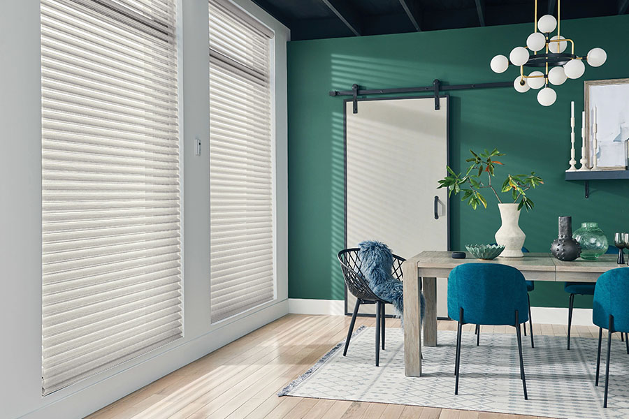 Versatile sheer shades let you decide how much of a view you want while enjoying your Philadelphia dining room. White sheer shades on windows in a green dining room