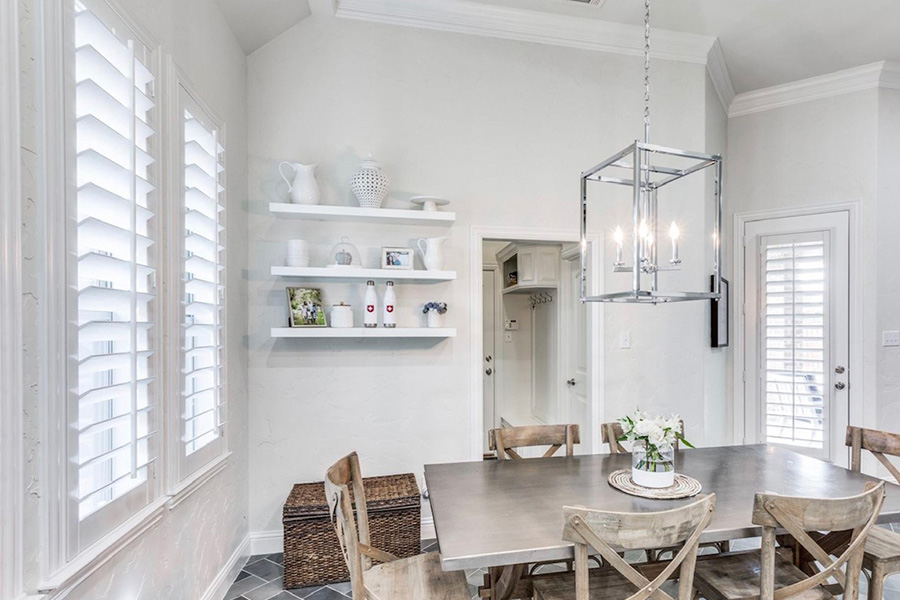 Polywood shutters is a great addition to liven up the chef's gourmet kitchen. White polywood shutters in a kitchen.