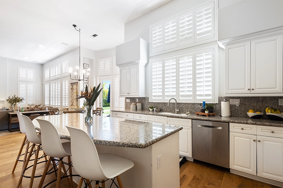 White Polywood shutters on kitchen windows